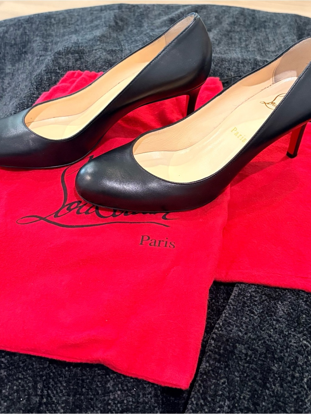 Christian Louboutin Black Leather Round-Toe Pumps with Red Sole